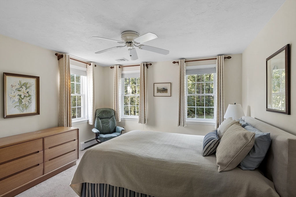 3 Brandy Hollow Littleton, MA 01460 - Photo 22 of 40 a bedroom with a bed and window