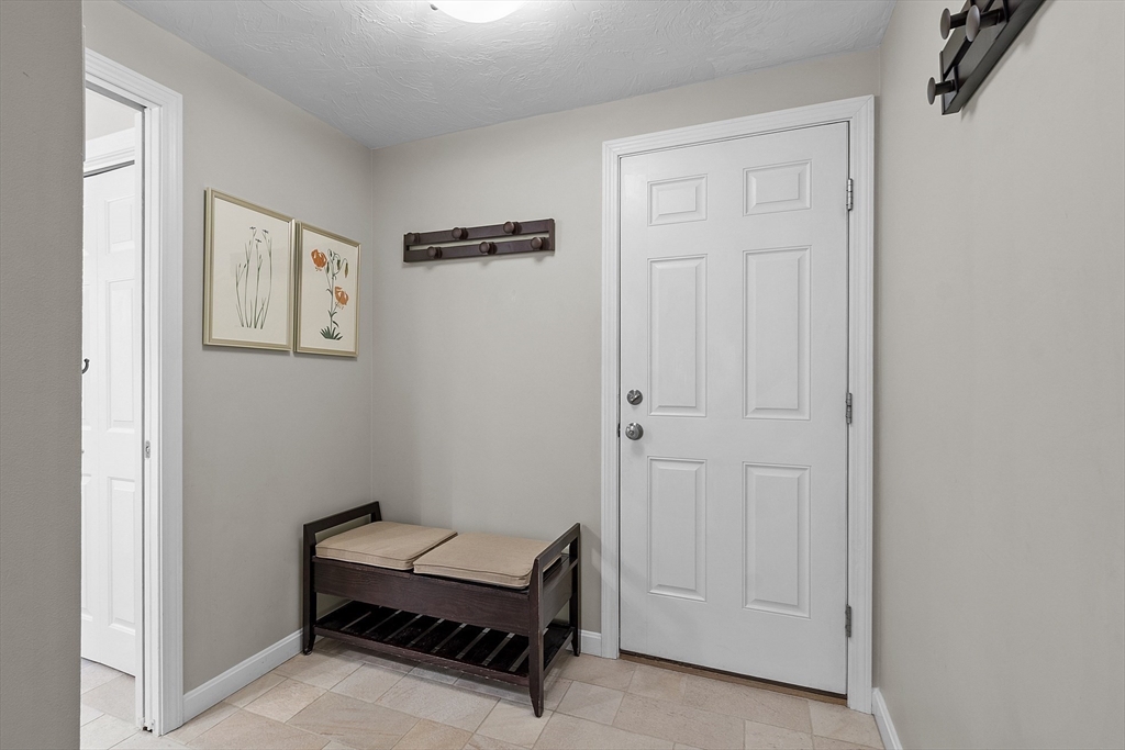 3 Brandy Hollow Littleton, MA 01460 - Photo 25 of 40 a room with a table and a window