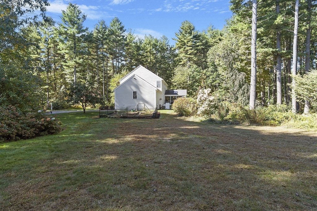 3 Brandy Hollow Littleton, MA 01460 - Photo 39 of 40 a view of a tiny house with a yard