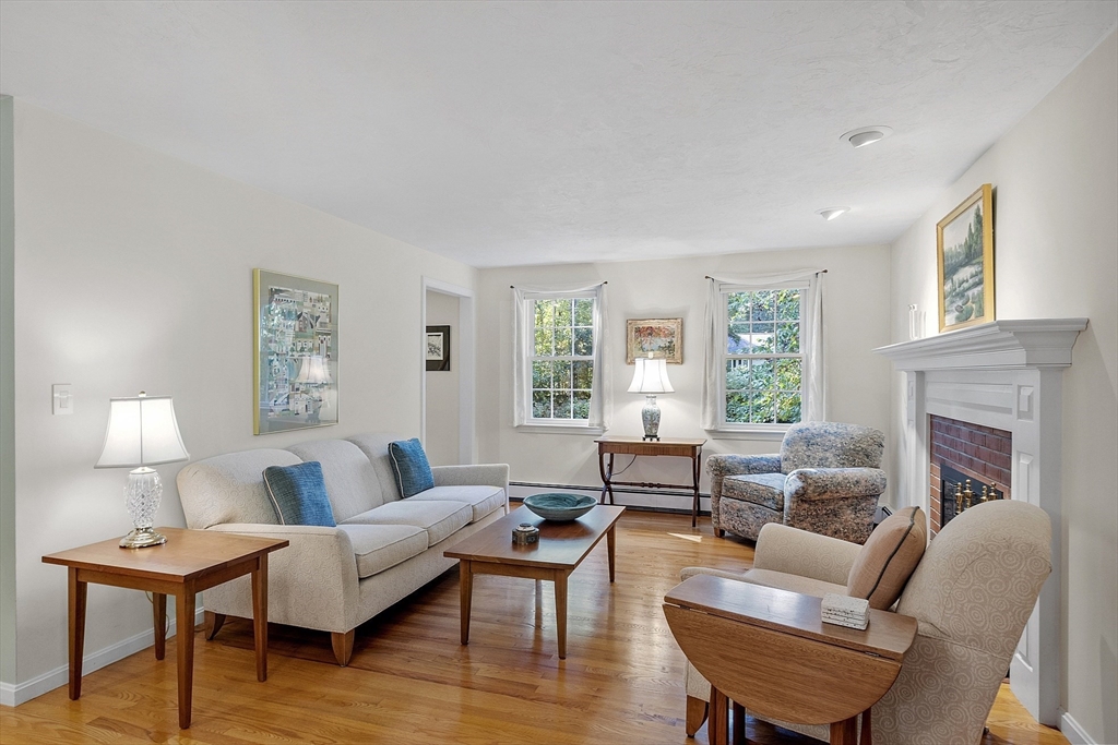 3 Brandy Hollow Littleton, MA 01460 - Photo 9 of 40 a living room with furniture and a fireplace