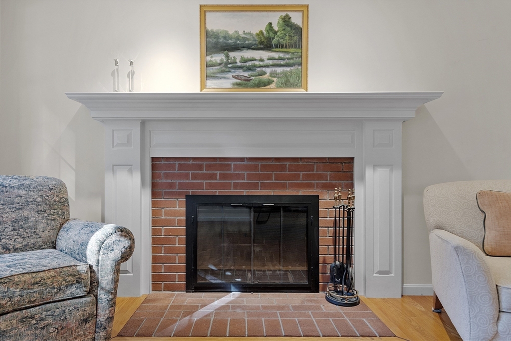 3 Brandy Hollow Littleton, MA 01460 - Photo 10 of 40 a living room with furniture and a fireplace