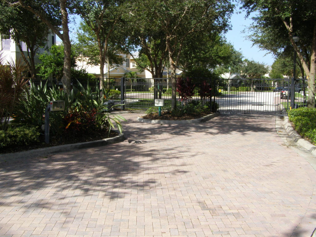 1610 Southwest Prosperity Way Palm City, FL 34990 - Photo 22 of 23 decorative Gated entrance