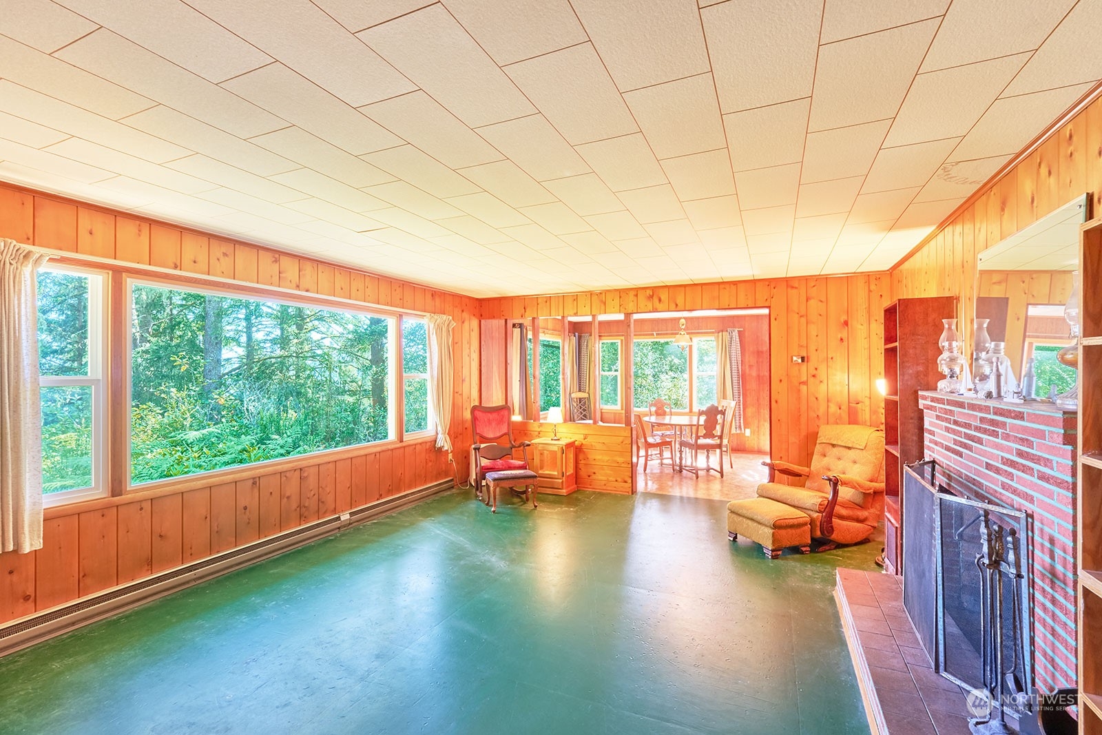 30708 Sandridge Road Ocean Park, WA 98640 - Photo 16 of 37 a living room with furniture and floor to ceiling windows