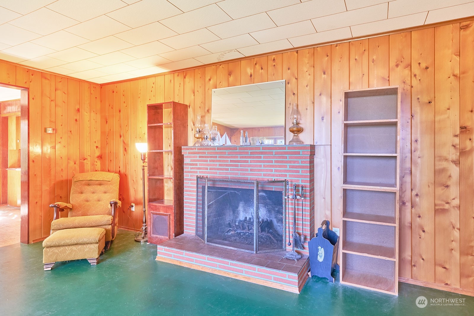30708 Sandridge Road Ocean Park, WA 98640 - Photo 17 of 37 a living room with furniture and a fireplace