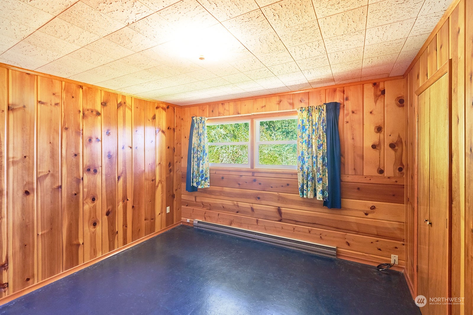 30708 Sandridge Road Ocean Park, WA 98640 - Photo 19 of 37 a view of room with window and wooden floor