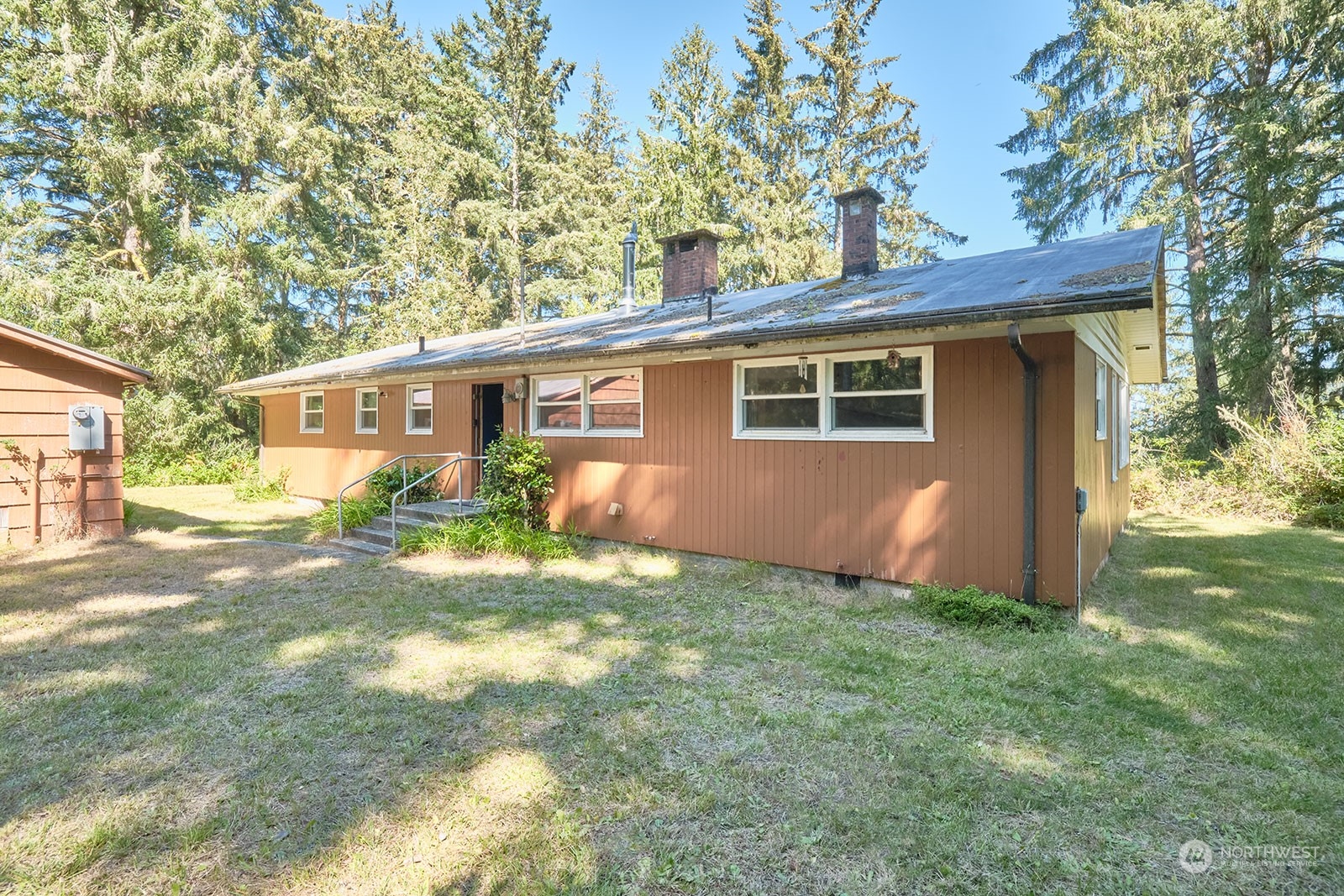 30708 Sandridge Road Ocean Park, WA 98640 - Photo 5 of 37 a view of a house with a yard
