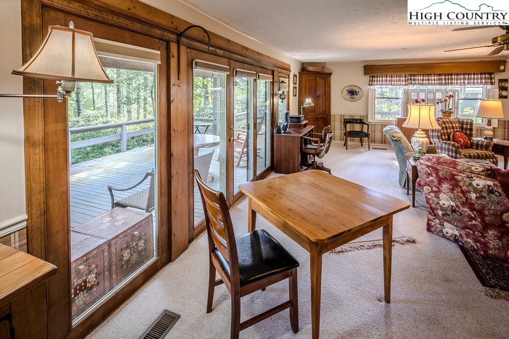94 Rhododendron Loop Newland, NC 28657 - Photo 21 of 50 a living room with furniture and a table