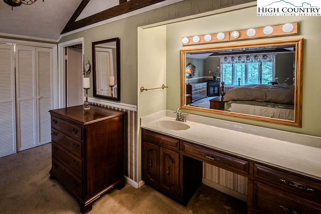 94 Rhododendron Loop Newland, NC 28657 - Photo 35 of 50 a kitchen that has a sink and a stove
