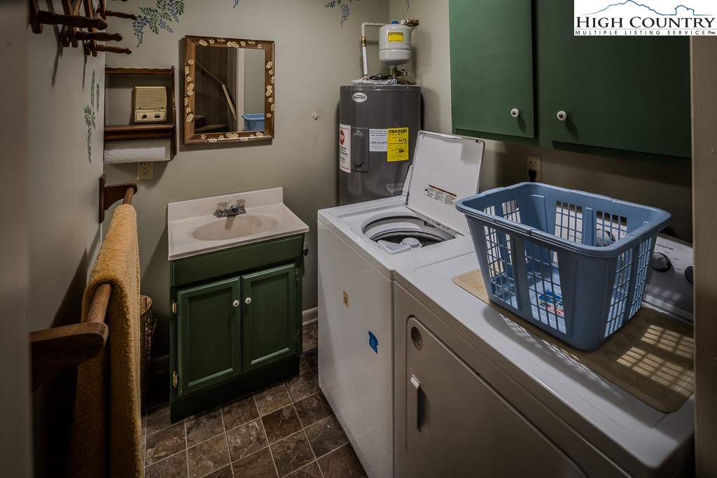 94 Rhododendron Loop Newland, NC 28657 - Photo 44 of 50 a utility room with two washing machine