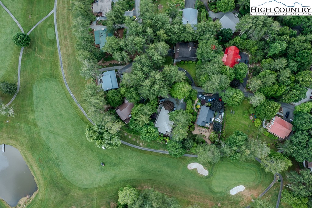 94 Rhododendron Loop Newland, NC 28657 - Photo 50 of 50 a backyard of a house with lots of green space