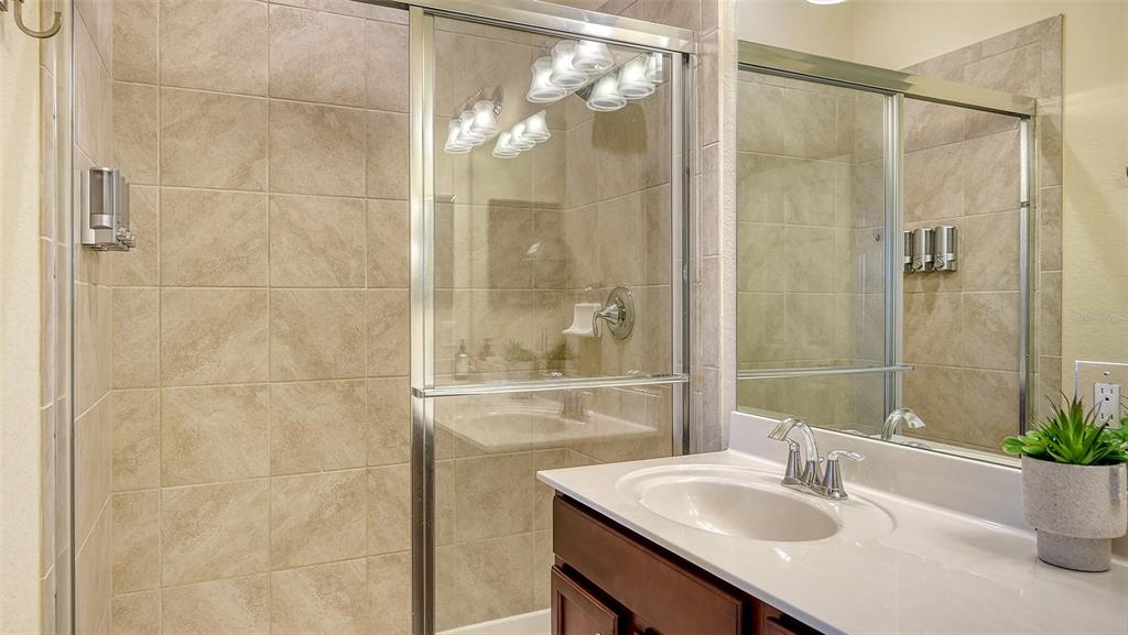 20223 Lagente Circle Venice, FL 34293 - Photo 22 of 71 a bathroom with a sink and a mirror