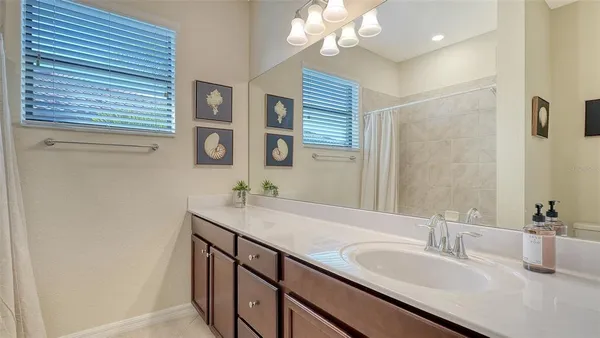 a view of a house with swimming pool and a yard