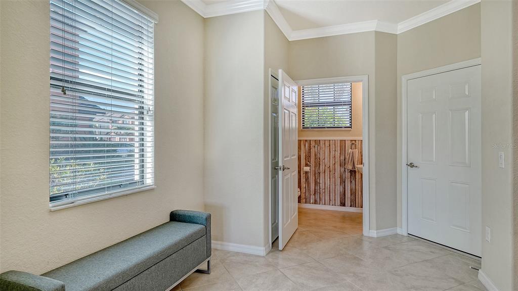 20223 Lagente Circle Venice, FL 34293 - Photo 32 of 71 a view of room with window and a ceiling fan