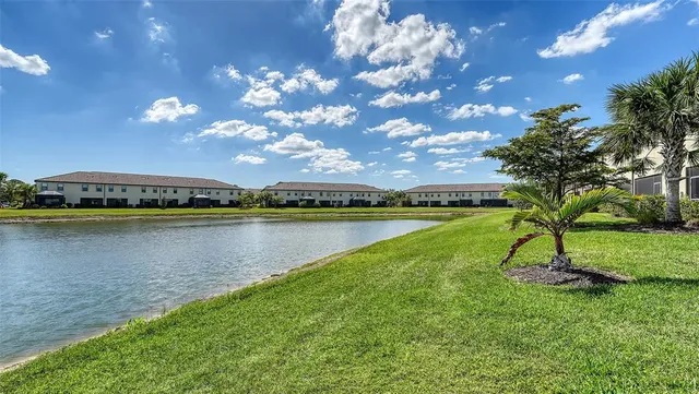 a view of a swimming pool with a lounge chairs