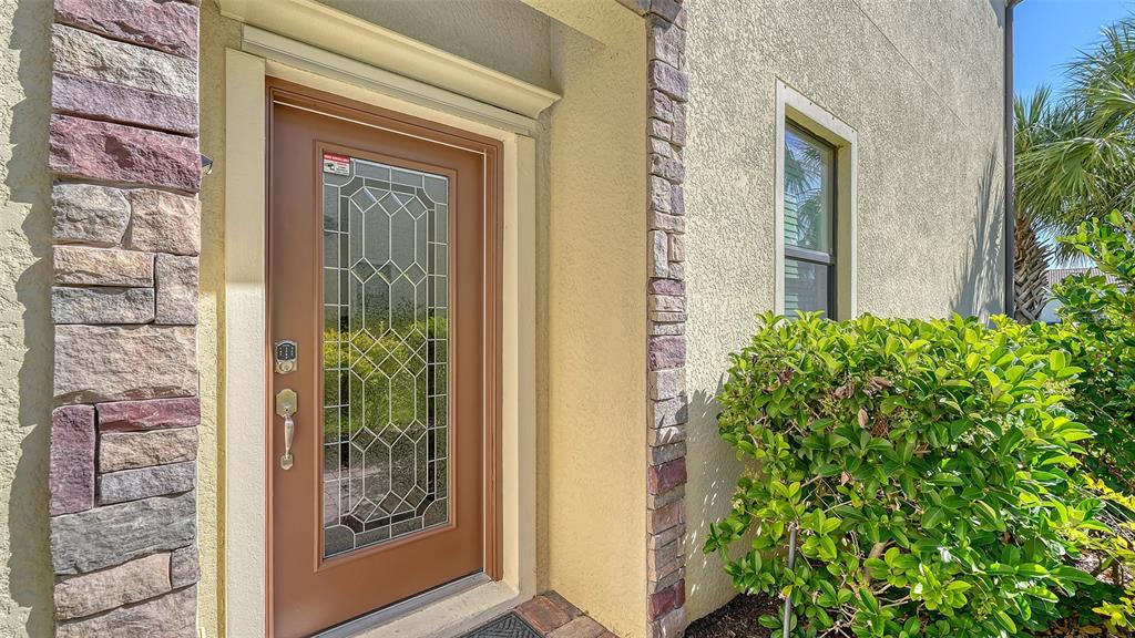 20223 Lagente Circle Venice, FL 34293 - Photo 4 of 71 a view of a glass door with a window