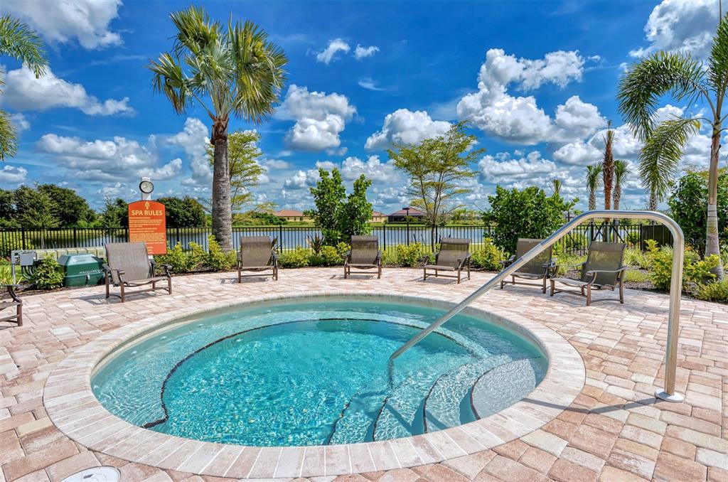 20223 Lagente Circle Venice, FL 34293 - Photo 55 of 71 a view of a swimming pool with a lounge chairs