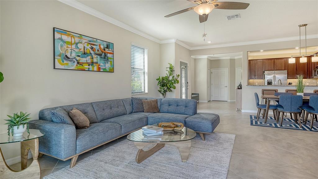 20223 Lagente Circle Venice, FL 34293 - Photo 7 of 71 a living room with furniture and a large window