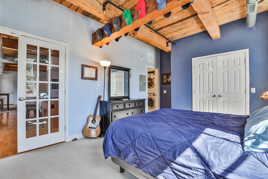 25 Cedar Street, Unit 4 Amesbury, MA 01913 - Photo 10 of 20 a bedroom with a bed and a window