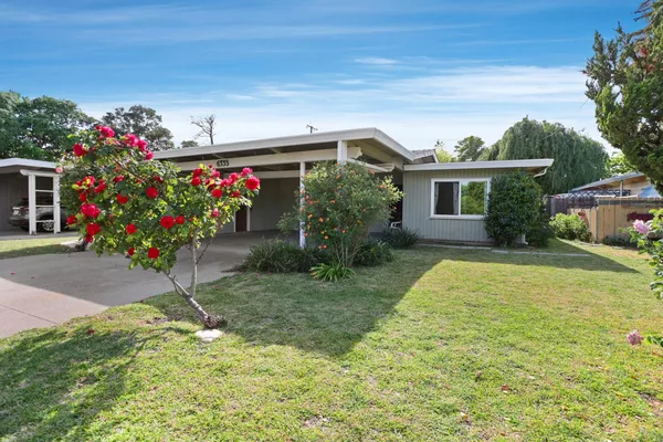 a house view with a garden space