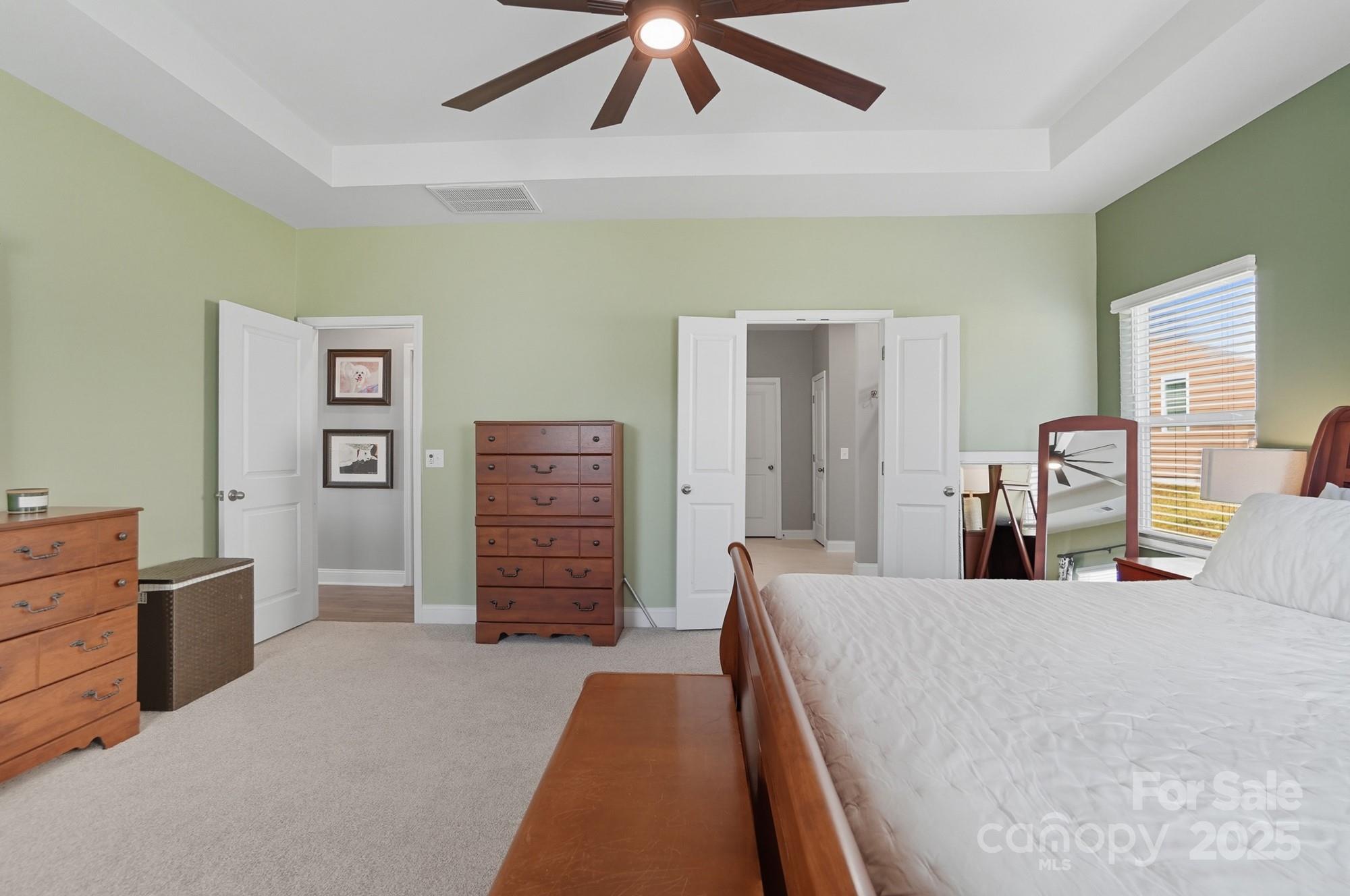 1325 Black Walnut Street Monroe, NC 28112 - Photo 19 of 46 a bedroom with a bed and dresser