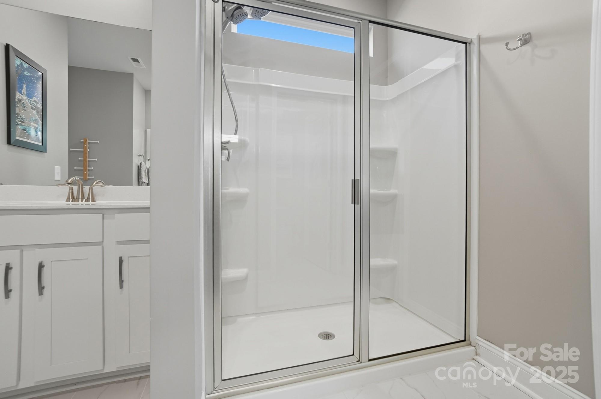 1325 Black Walnut Street Monroe, NC 28112 - Photo 23 of 46 a bathroom with a shower and a sink