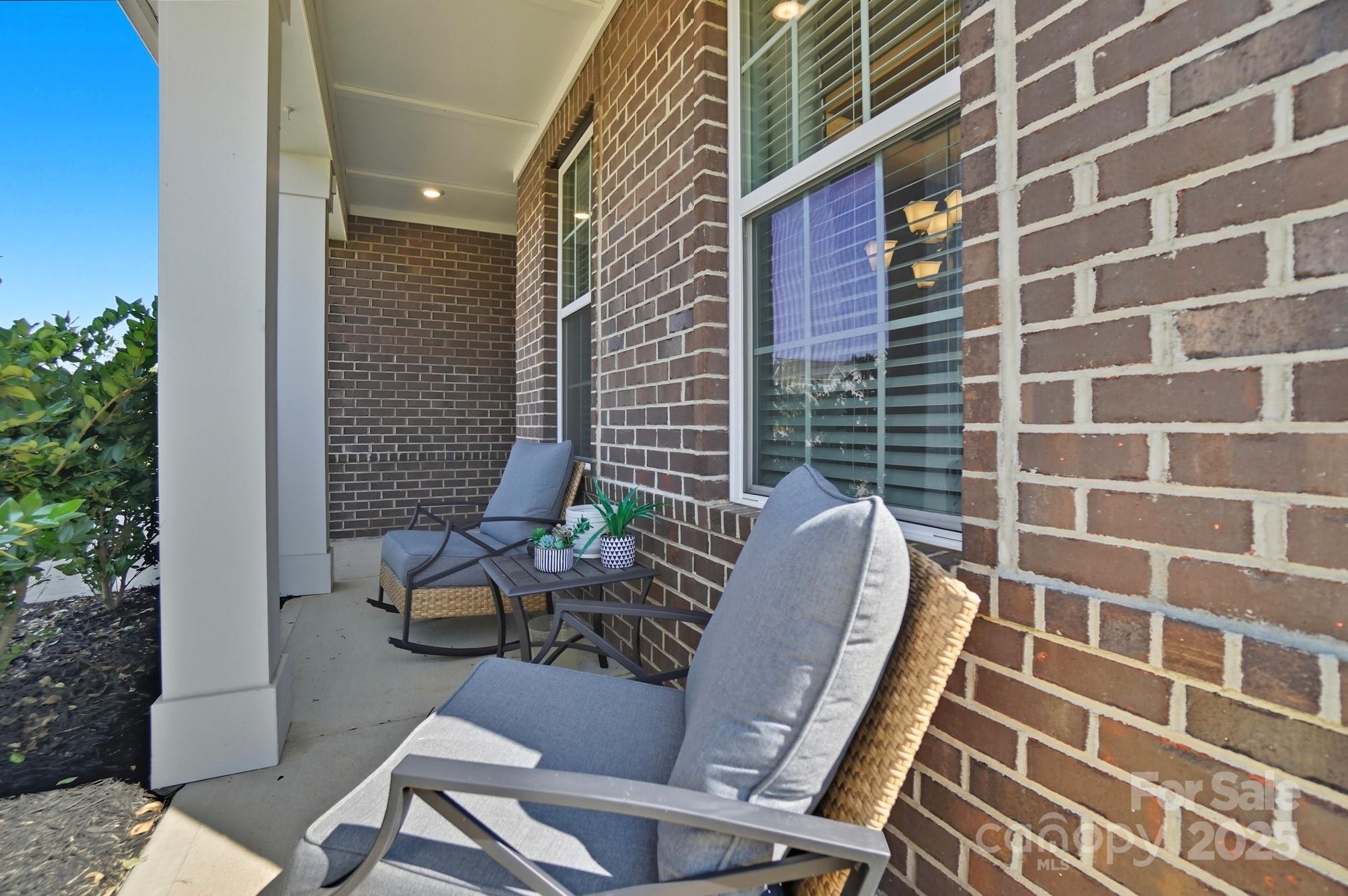 1325 Black Walnut Street Monroe, NC 28112 - Photo 5 of 46 a view of a patio with a chairs and table in the patio