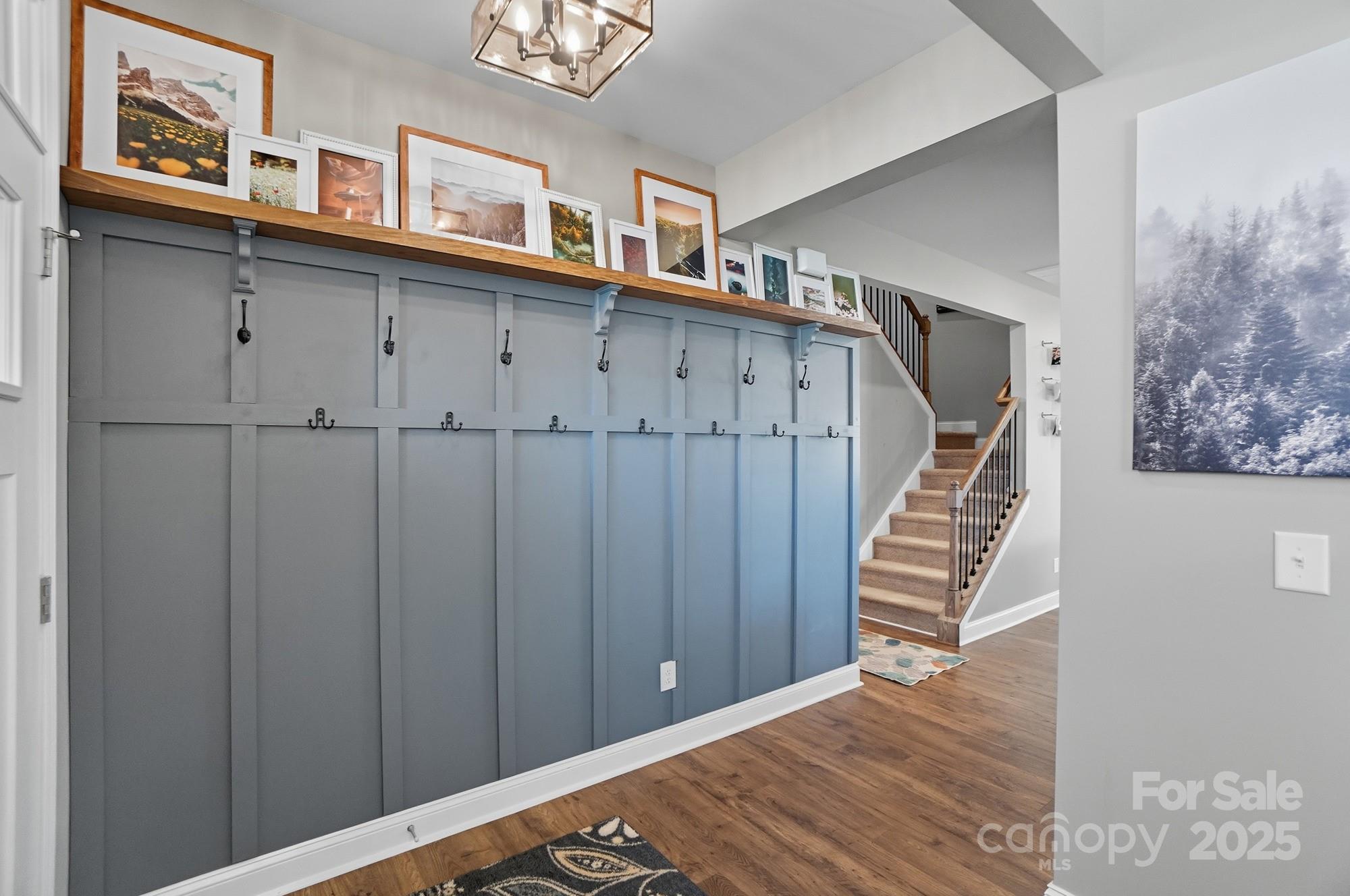 1325 Black Walnut Street Monroe, NC 28112 - Photo 8 of 46 a view of a hallway with wooden floor and entryway