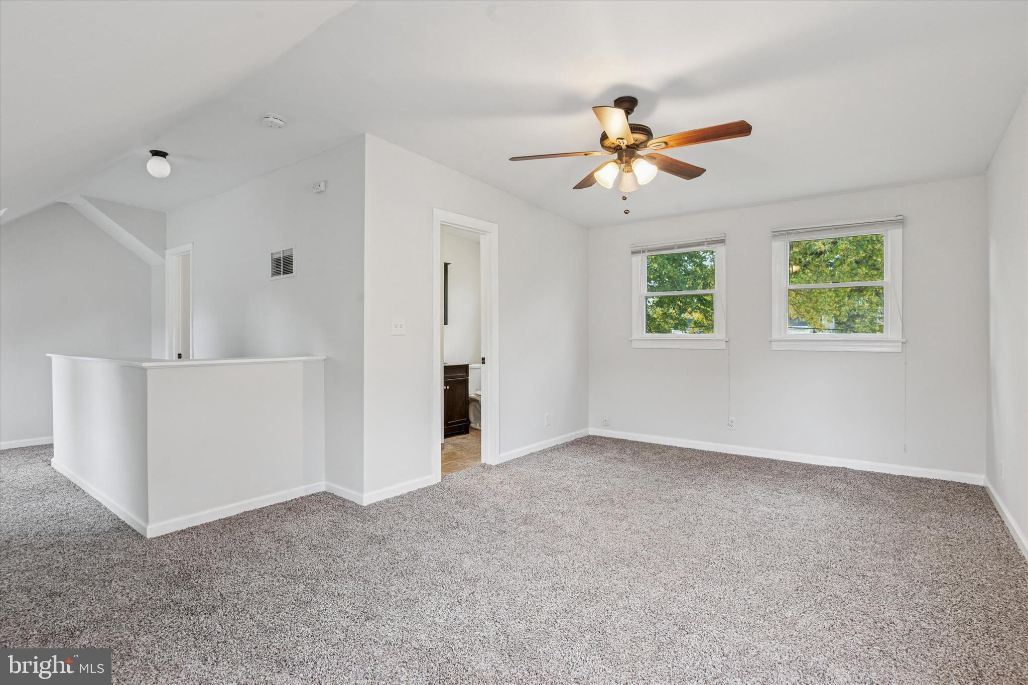 206 Decalb Avenue Wilmington, DE 19804 - Photo 9 of 14 a view of an empty room with window and a ceiling fan