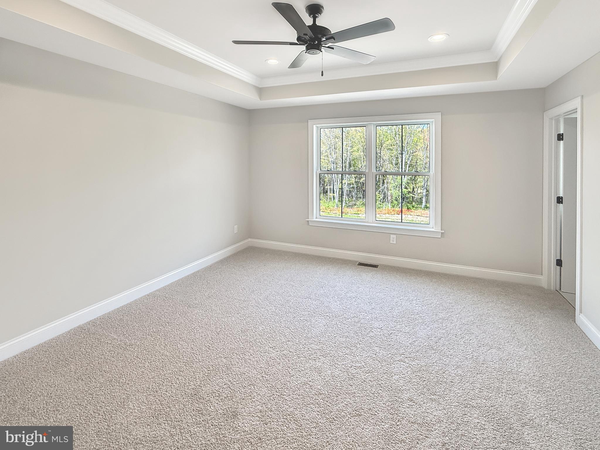 14 Schadle Road Perkasie, PA 18944 - Photo 27 of 44 an empty room with a window and a fan