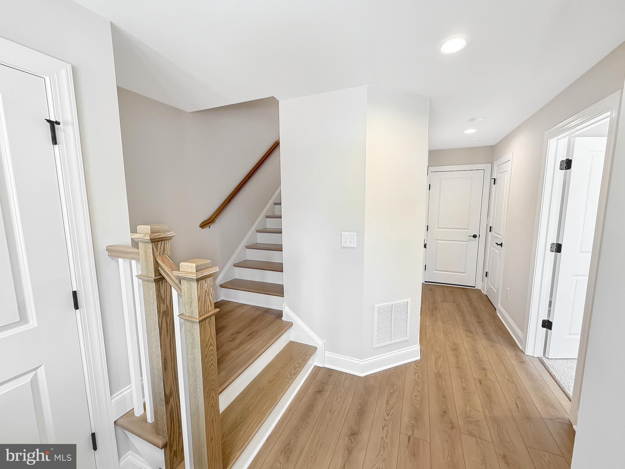 14 Schadle Road Perkasie, PA 18944 - Photo 3 of 44 a view of a hallway with wooden floor and staircase