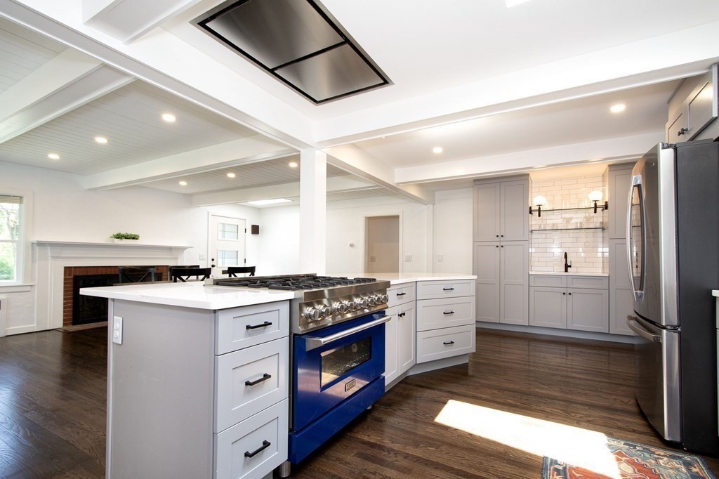 18 Liberty Pole Road Hingham, MA 02043 - Photo 11 of 37 a kitchen with a stove and a refrigerator