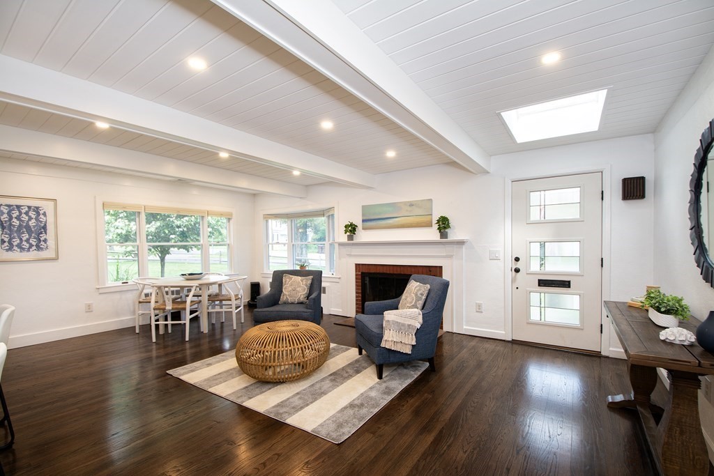 18 Liberty Pole Road Hingham, MA 02043 - Photo 15 of 37 a living room with furniture and a fireplace