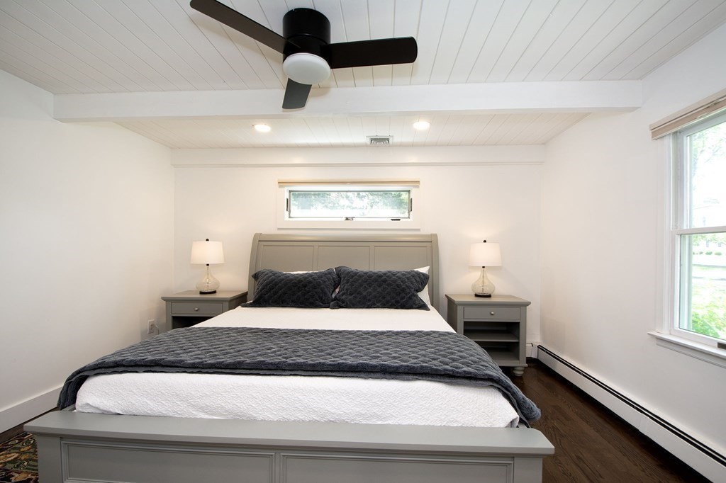 18 Liberty Pole Road Hingham, MA 02043 - Photo 18 of 37 a bedroom with a bed and window