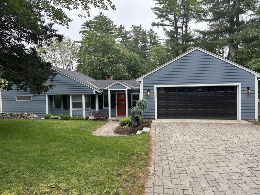 18 Liberty Pole Road Hingham, MA 02043 - Photo 2 of 37 a front view of a house with garden
