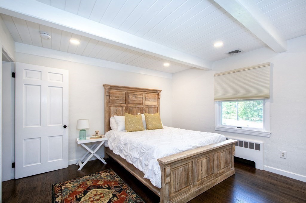 18 Liberty Pole Road Hingham, MA 02043 - Photo 24 of 37 a bedroom with a bed and a window