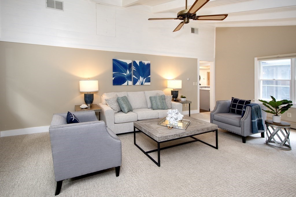 18 Liberty Pole Road Hingham, MA 02043 - Photo 5 of 37 a living room with furniture and a couch