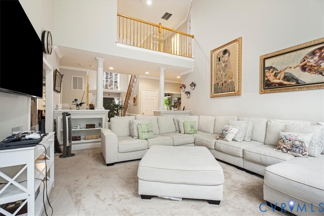 28 Millbrook Road Stafford, VA 22554 - Photo 14 of 44 a living room with furniture a flat screen tv and kitchen view