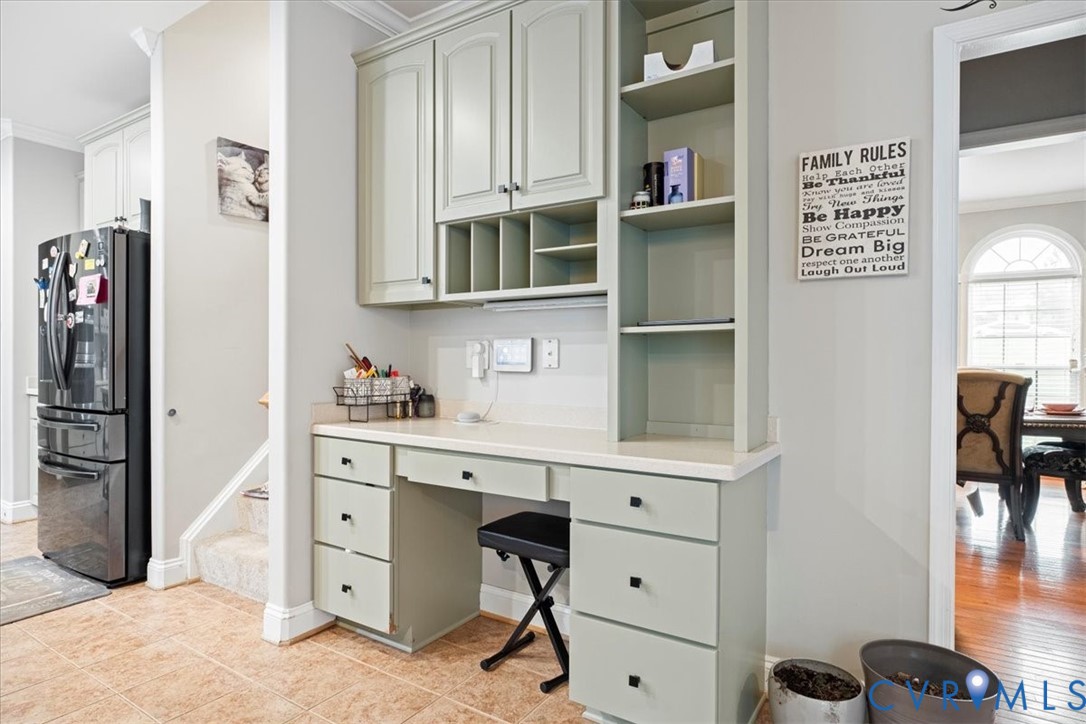 28 Millbrook Road Stafford, VA 22554 - Photo 18 of 44 a kitchen with stainless steel appliances cabinets and a table