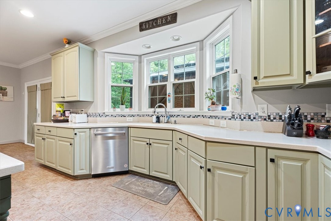 28 Millbrook Road Stafford, VA 22554 - Photo 20 of 44 a kitchen with granite countertop a sink and white cabinets