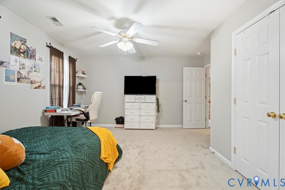 28 Millbrook Road Stafford, VA 22554 - Photo 33 of 44 a living room with furniture and a flat screen tv