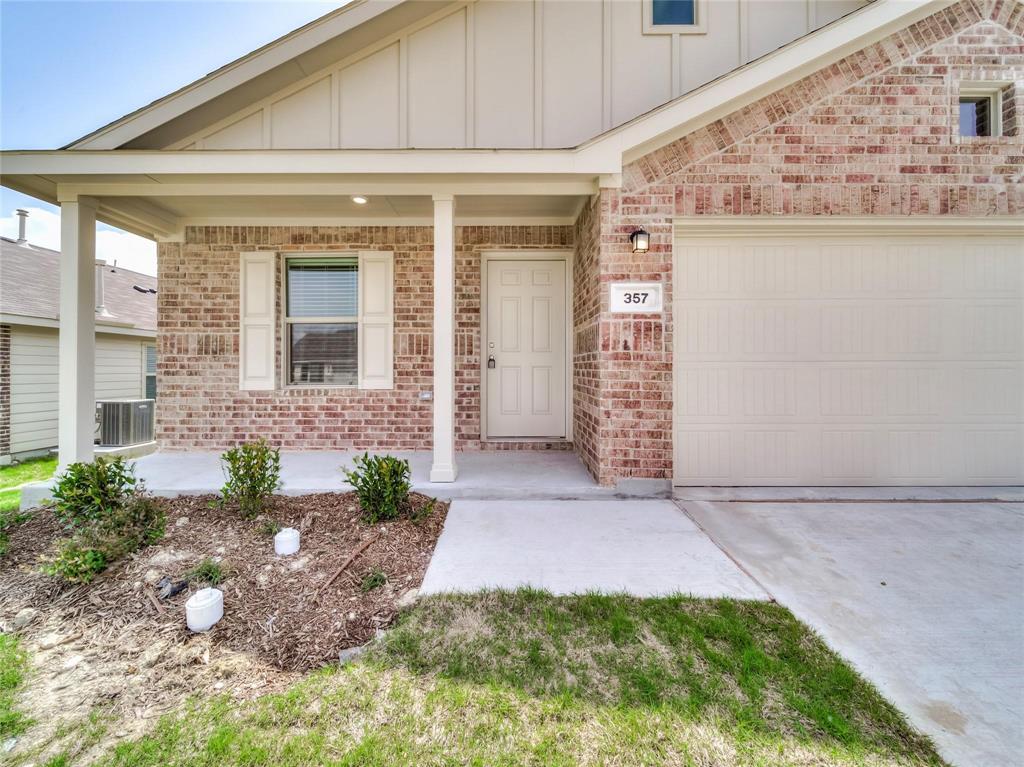 357 Sun Bluff Road Fort Worth, TX 76052 - Photo 1 of 35 Brick exterior with an attached garage and covered front porch
