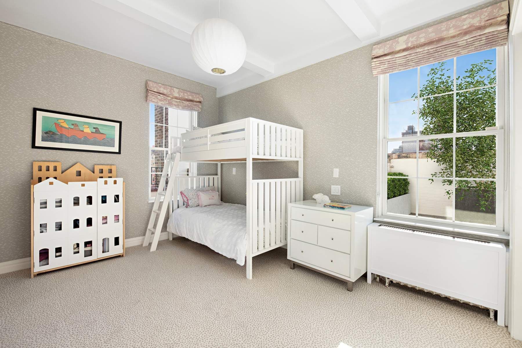 9 East 96th Street, Unit PH Manhattan, NY 10128 - Photo 12 of 18 a bedroom with furniture and a large window