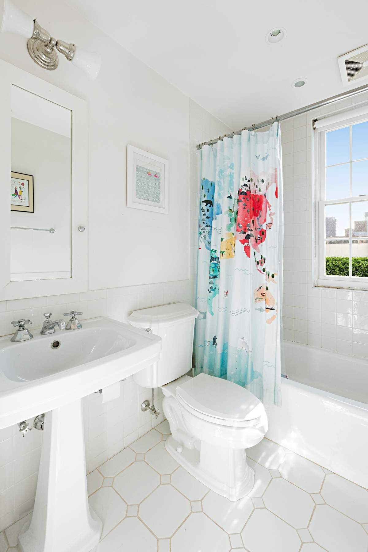 9 East 96th Street, Unit PH Manhattan, NY 10128 - Photo 15 of 18 a bathroom with a sink toilet and shower