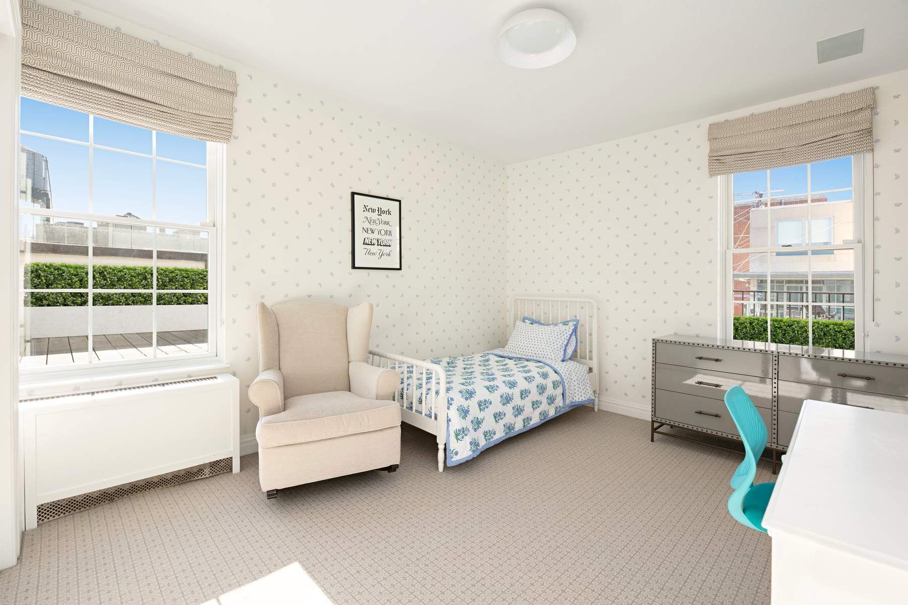 9 East 96th Street, Unit PH Manhattan, NY 10128 - Photo 16 of 18 a bedroom with furniture and a large window