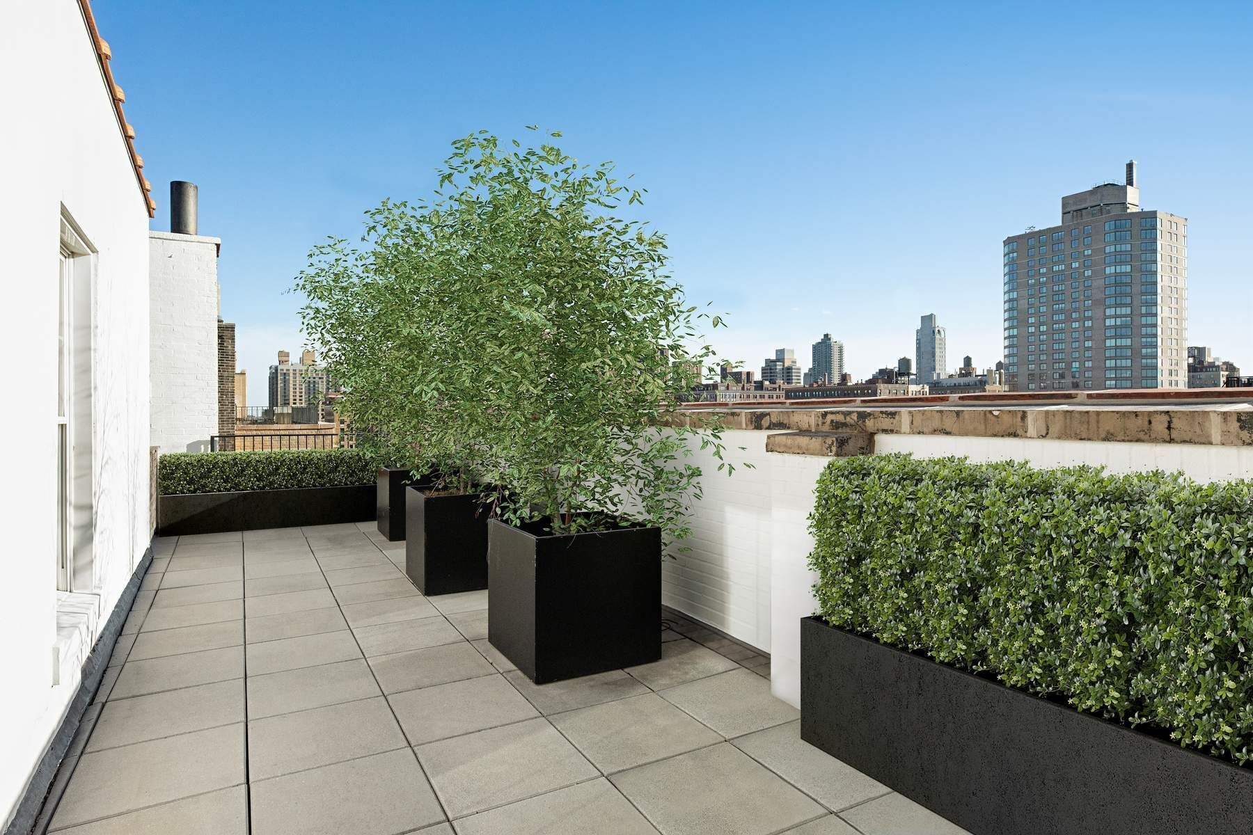 9 East 96th Street, Unit PH Manhattan, NY 10128 - Photo 5 of 18 a view of terrace with seating space and plants