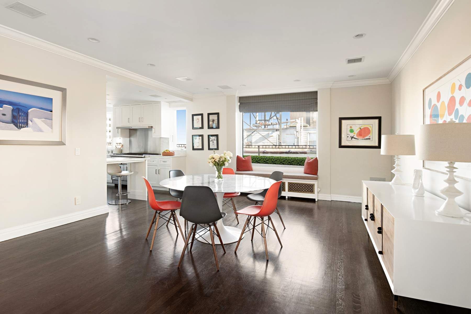 9 East 96th Street, Unit PH Manhattan, NY 10128 - Photo 6 of 18 a view of a dining room with furniture and wooden floor