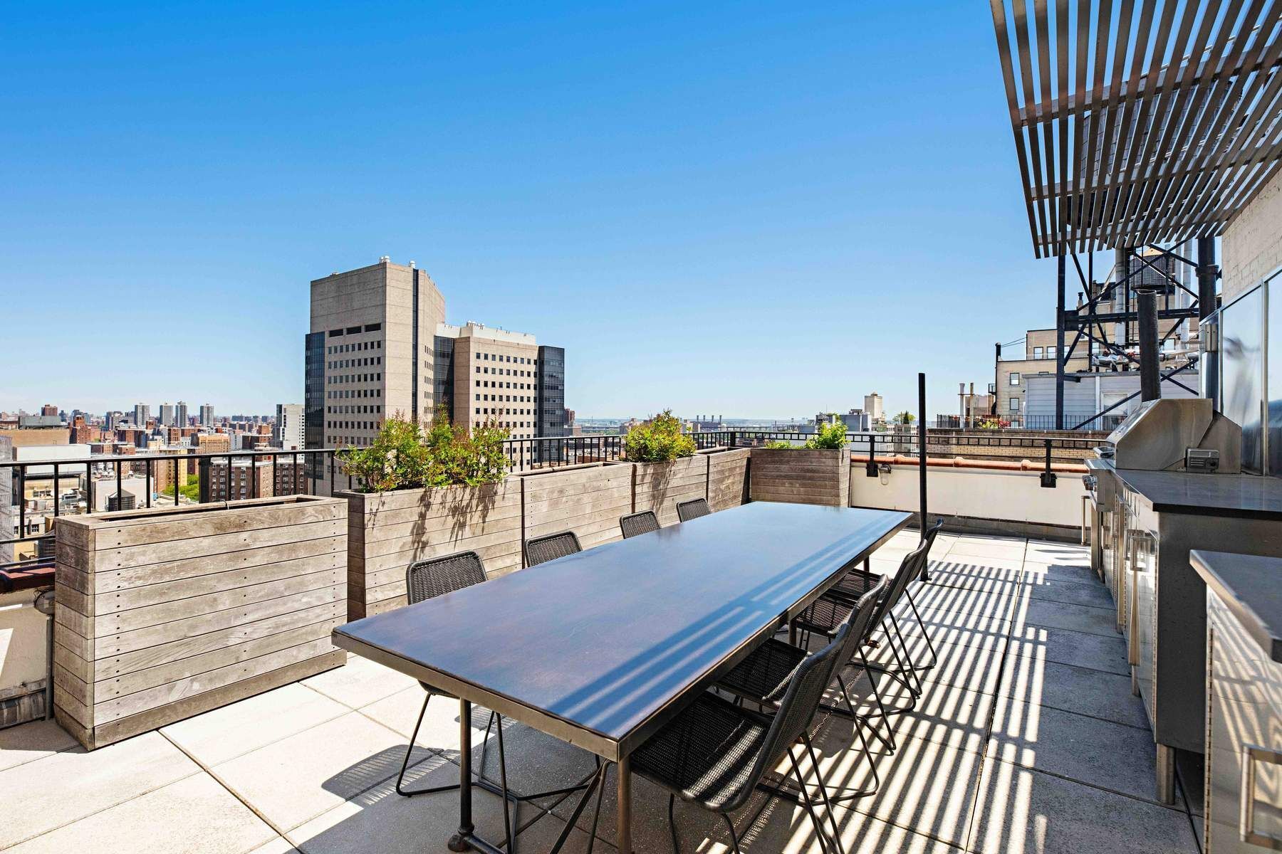 9 East 96th Street, Unit PH Manhattan, NY 10128 - Photo 8 of 18 a view of a balcony with chairs