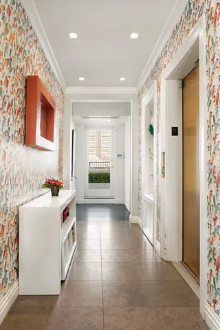 a view of a balcony with chairs