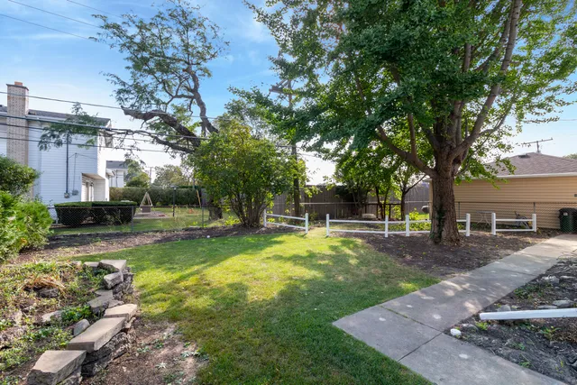 a view of a backyard with a garden