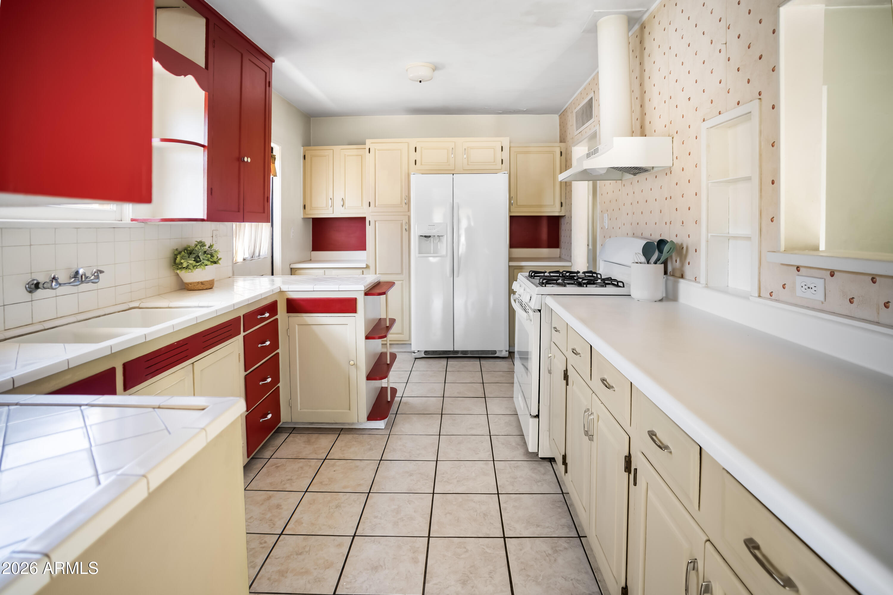 508 North Robson Mesa, AZ 85201 - Photo 8 of 19 a kitchen with a sink stove and cabinets